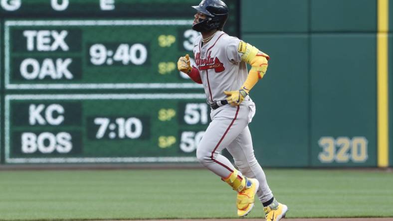 Aug 8, 2023; Pittsburgh, Pennsylvania, USA;  Atlanta Braves right fielder Ronald Acuna Jr. (13) circles the bases on a solo home run against the Pittsburgh Pirates during the first inning at PNC Park. Mandatory Credit: Charles LeClaire-USA TODAY Sports