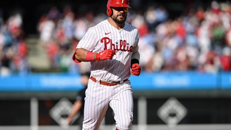 Aug 8, 2023; Philadelphia, Pennsylvania, USA;  Philadelphia Phillies left fielder Kyle Schwarber (12) rounds the bases after hitting a three run home run in the fourth inning against the Washington Nationals at Citizens Bank Park.The Phillies won 8-4. Mandatory Credit: John Geliebter-USA TODAY Sports