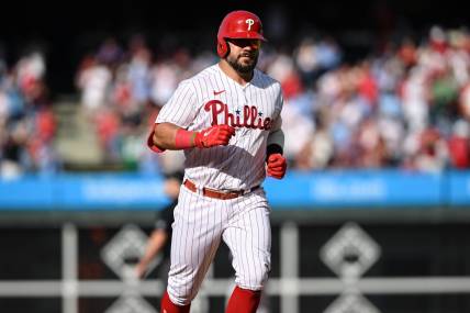 Aug 8, 2023; Philadelphia, Pennsylvania, USA;  Philadelphia Phillies left fielder Kyle Schwarber (12) rounds the bases after hitting a three run home run in the fourth inning against the Washington Nationals at Citizens Bank Park.The Phillies won 8-4. Mandatory Credit: John Geliebter-USA TODAY Sports