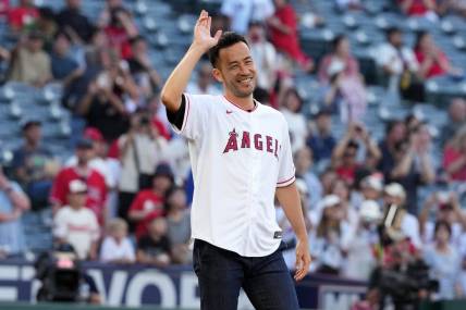 Aug 8, 2023; Anaheim, California, USA; LA Galaxy defender Maya Yoshida gestures after throwing the ceremonial first pitch before the game between the Los Angeles Angels and the San Francisco Giants at Angel Stadium. Mandatory Credit: Kirby Lee-USA TODAY Sports