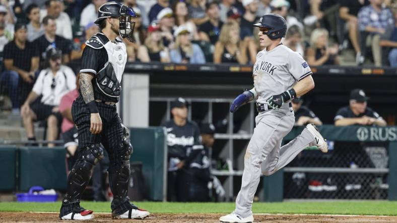 Aug 8, 2023; Chicago, Illinois, USA; New York Yankees center fielder Harrison Bader (22) scores against the Chicago White Sox during the fourth inning at Guaranteed Rate Field. Mandatory Credit: Kamil Krzaczynski-USA TODAY Sports