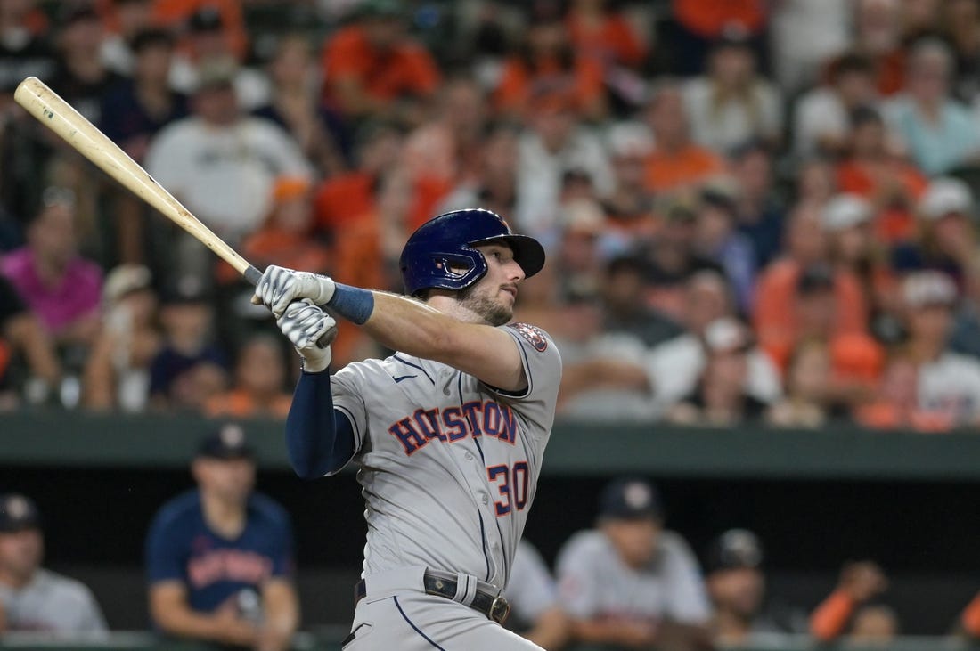 Aug 8, 2023; Baltimore, Maryland, USA;  Houston Astros right fielder Kyle Tucker (30) swings through a ninth inning grand slam against the Baltimore Orioles at Oriole Park at Camden Yards. Mandatory Credit: Tommy Gilligan-USA TODAY Sports