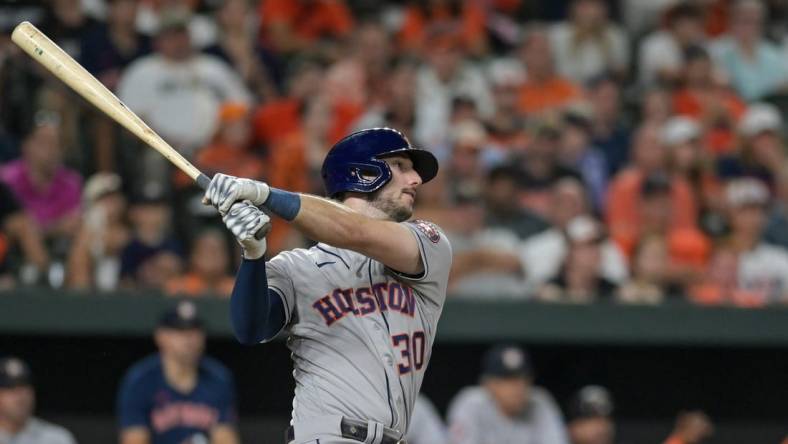 Aug 8, 2023; Baltimore, Maryland, USA;  Houston Astros right fielder Kyle Tucker (30) swings through a ninth inning grand slam against the Baltimore Orioles at Oriole Park at Camden Yards. Mandatory Credit: Tommy Gilligan-USA TODAY Sports