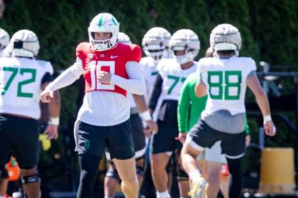 Oregon quarterback Bo Nix works out with the Ducks during practice Wednesday, Aug. 9, 2023 in Eugene.