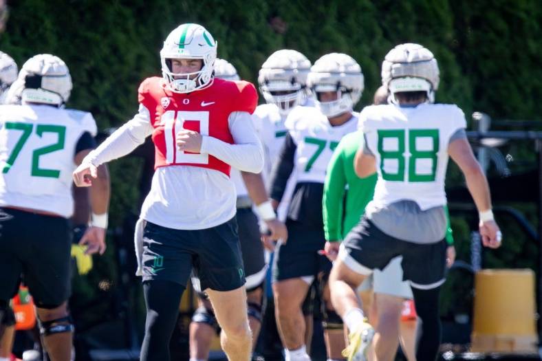 Oregon quarterback Bo Nix works out with the Ducks during practice Wednesday, Aug. 9, 2023 in Eugene.