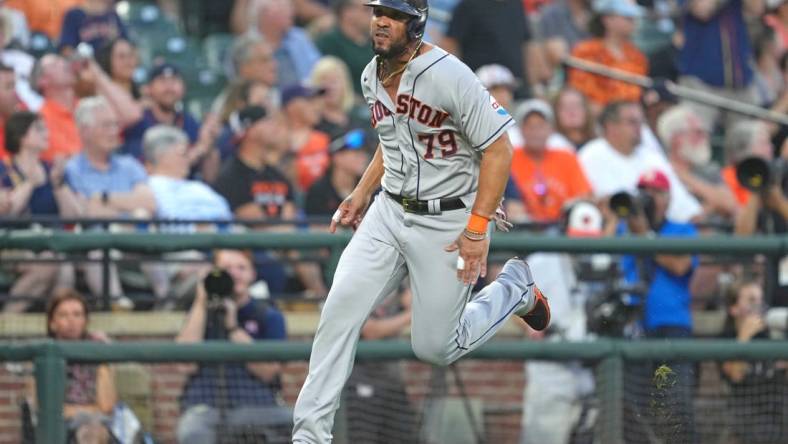 Aug 9, 2023; Baltimore, Maryland, USA; Houston Astros first baseman Jose Abreu (79) rounds third base to score on a single by Jose Altuve (not shown) in the second inning against the Baltimore Orioles at Oriole Park at Camden Yards. Mandatory Credit: Mitch Stringer-USA TODAY Sports