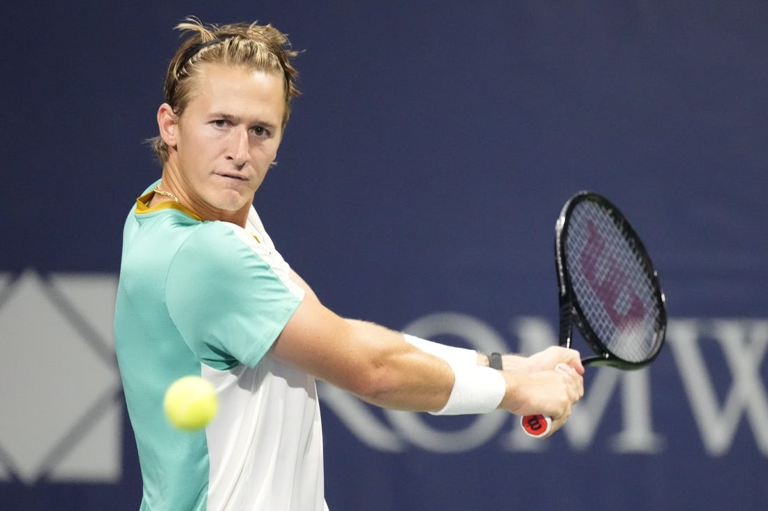 Aug 9, 2023; Toronto, Ontario, Canada; Sebastian Korda (USA) follows a ball hit by Aleksandar Vukic (not pictured) at Sobeys Stadium. Mandatory Credit: John E. Sokolowski-USA TODAY Sports