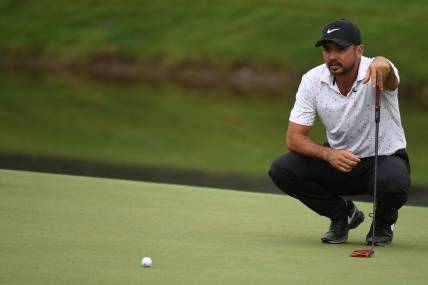 Aug 10, 2023; Memphis, Tennessee, USA; Jason Day lines up a putt on the 18th green during the first round of the FedEx St. Jude Championship golf tournament. Mandatory Credit: Christopher Hanewinckel-USA TODAY Sports