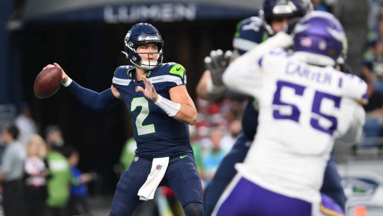 Aug 10, 2023; Seattle, Washington, USA; Seattle Seahawks quarterback Drew Lock (2) looks to pass the ball against the Minnesota Vikings during the first half at Lumen Field. Mandatory Credit: Steven Bisig-USA TODAY Sports