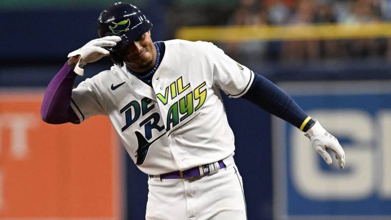 Aug 11, 2023; St. Petersburg, Florida, USA; Tampa Bay Rays shortstop Wander Franco (5) celebrates after hitting a two run single in the third inning  against the Cleveland Guardians at Tropicana Field. Mandatory Credit: Jonathan Dyer-USA TODAY Sports