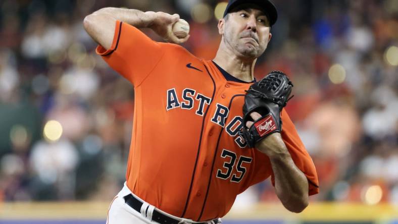 Aug 11, 2023; Houston, Texas, USA;  Houston Astros starting pitcher Justin Verlander (35) pitches against the Los Angeles Angels in the first inning at Minute Maid Park. Mandatory Credit: Thomas Shea-USA TODAY Sports