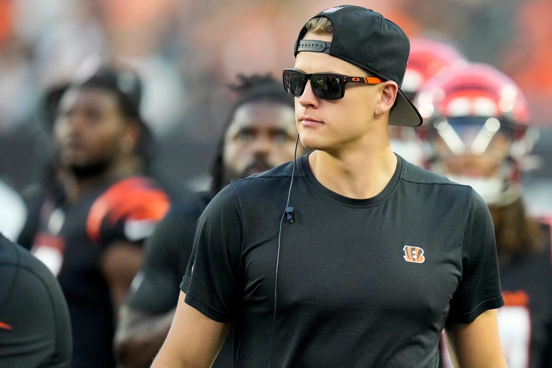 Cincinnati Bengals quarterback Joe Burrow (9) watches from the sideline in the second quarter of the NFL Preseason Week 1 game between the Cincinnati Bengals and the Green Bay Packers at Paycor Stadium in downtown Cincinnati on Friday, Aug. 11, 2023. The Packers led 21-16 at halftime.