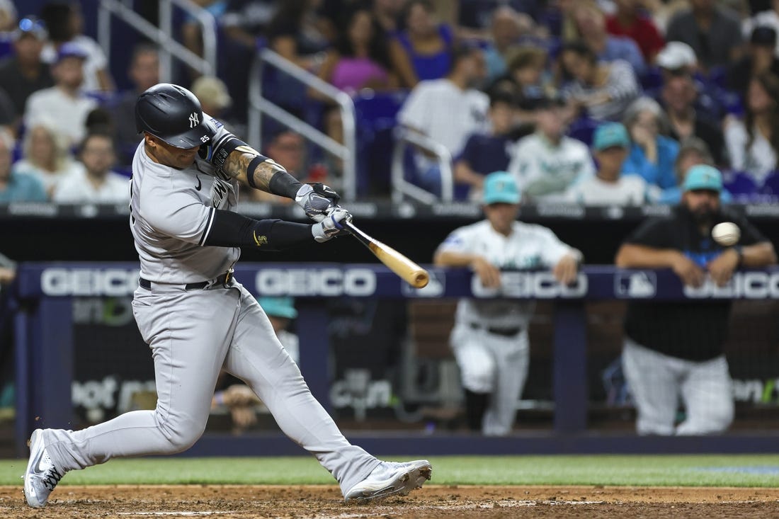 New York Yankees' Kyle Higashioka drops his bat after making