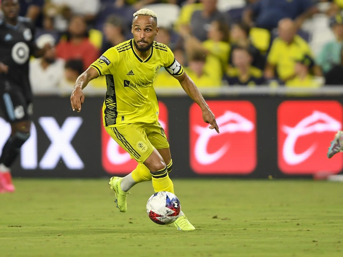 Aug 11, 2023; Nashville, TN, USA; Nashville SC midfielder Hany Mukhtar (10) dribbles the ball against the Minnesota United during the second half at GEODIS Park. Mandatory Credit: Steve Roberts-USA TODAY Sports