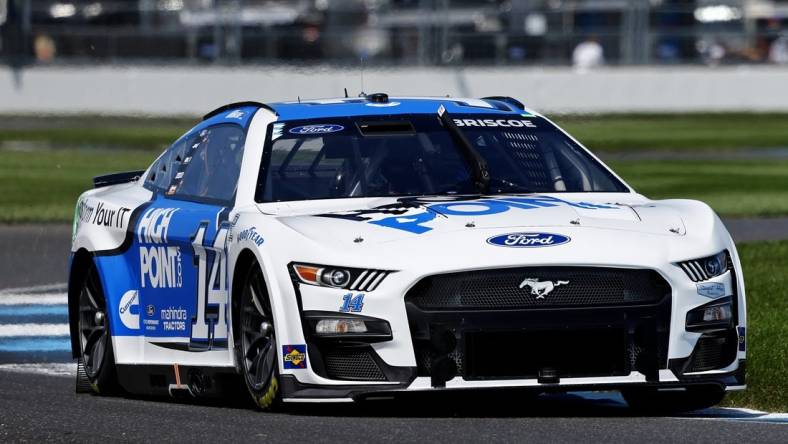 Aug 12, 2023; Speedway, Indiana, USA; NASCAR Cup Series driver Chase Briscoe (14) during qualifying for the Verizon 200 at the Brickyard at Indianapolis Motor Speedway Road Course. Mandatory Credit: Mike Dinovo-USA TODAY Sports