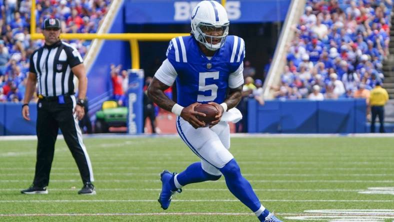 Aug 12, 2023; Orchard Park, New York, USA; Indianapolis Colts quarterback Anthony Richardson (5) runs with the ball against the Buffalo Bills during the first half at Highmark Stadium. Mandatory Credit: Gregory Fisher-USA TODAY Sports