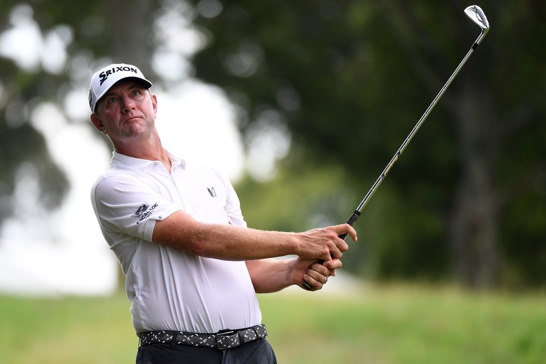 Aug 12, 2023; Memphis, Tennessee, USA; Lucas Glover hits his second shot on the ninth hole during the third round of the FedEx St. Jude Championship golf tournament. Mandatory Credit: Christopher Hanewinckel-USA TODAY Sports