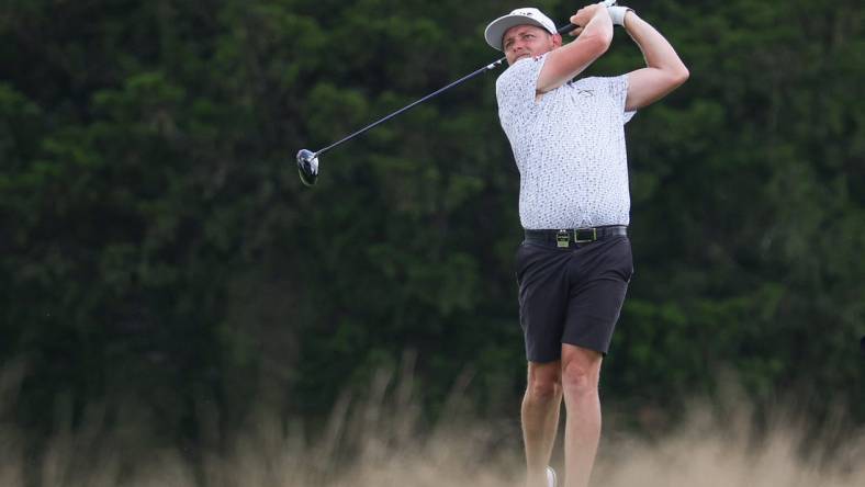 Aug 12, 2023; Bedminster, New Jersey, USA; Cameron Smith plays his driver from the eighth fairway during the second round of the LIV Golf Bedminster golf tournament at Trump National Bedminster. Mandatory Credit: Vincent Carchietta-USA TODAY Sports