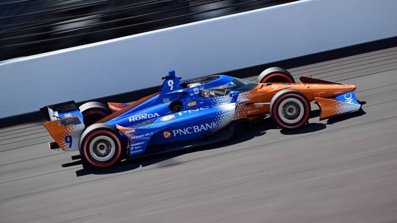 Aug 12, 2023; Speedway, Indiana, USA; Chip Ganassi Racing driver Scott Dixon (9) of New Zealand heads down the straight away during the Gallagher Grand Prix at the Indianapolis Motor Speedway Road Course. Mandatory Credit: Marc Lebryk-USA TODAY Sports