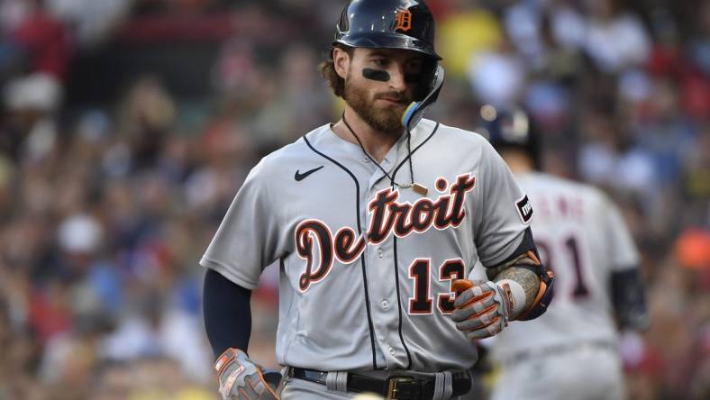 Aug 12, 2023; Boston, Massachusetts, USA;  Detroit Tigers catcher Eric Haase (13) heads to the dugout after hitting a home run against the Boston Red Sox during the fifth inning at Fenway Park. Mandatory Credit: Bob DeChiara-USA TODAY Sports