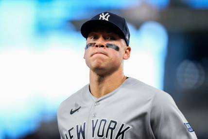 Aug 12, 2023; Miami, Florida, USA; New York Yankees right fielder Aaron Judge (99) runs back to the dug out against the Miami Marlins during the fifth inning at loanDepot Park. Mandatory Credit: Rich Storry-USA TODAY Sports