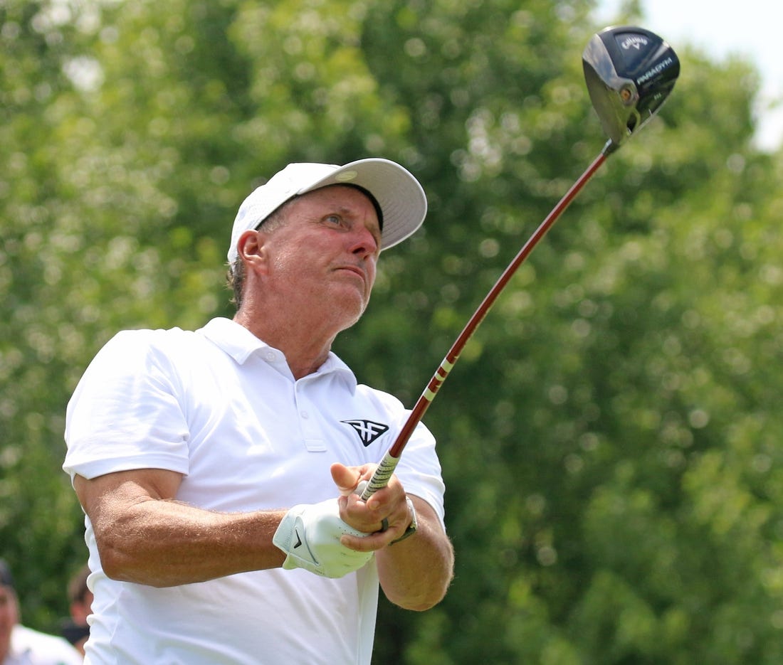 Bedminster, NJ August 12, 2023 -- Phil Mickelson at the first tee during the second round of the 2023 LIV Golf Tournament held at Trump National in Bedminster, NJ but Trump impersonator Thomas Mundy came to entertain on August 12, 2023.