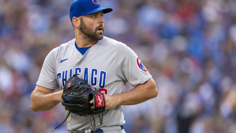 Aug 12, 2023; Toronto, Ontario, CAN; Chicago Cubs relief pitcher Michael Fulmer (32) looks on against the Toronto Blue Jays during the sixth inning at Rogers Centre. Mandatory Credit: Kevin Sousa-USA TODAY Sports