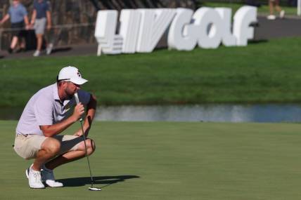 Aug 13, 2023; Bedminster, New Jersey, USA; Marc Leishman looks over his putt on the 18th hole during the final round of the LIV Golf Bedminster golf tournament at Trump National Bedminster. Mandatory Credit: Vincent Carchietta-USA TODAY Sports