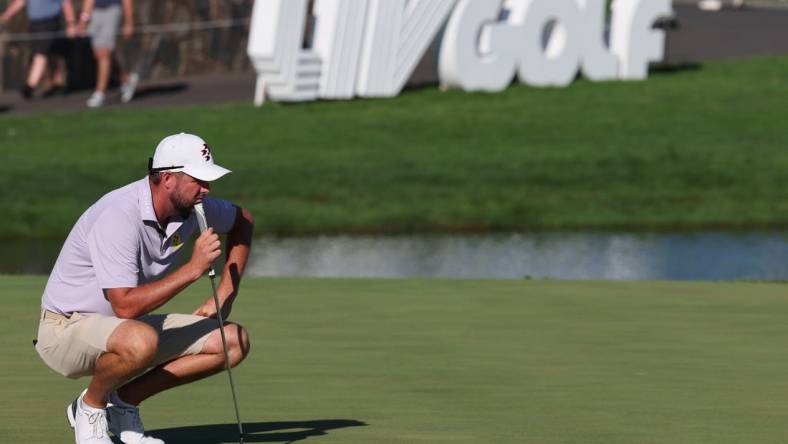 Aug 13, 2023; Bedminster, New Jersey, USA; Marc Leishman looks over his putt on the 18th hole during the final round of the LIV Golf Bedminster golf tournament at Trump National Bedminster. Mandatory Credit: Vincent Carchietta-USA TODAY Sports