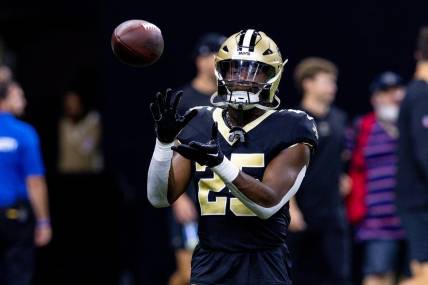 Aug 13, 2023; New Orleans, Louisiana, USA; New Orleans Saints running back Kendre Miller (25) warms up against the Kansas City Chiefs during pregame at Caesars Superdome. Mandatory Credit: Stephen Lew-USA TODAY Sports