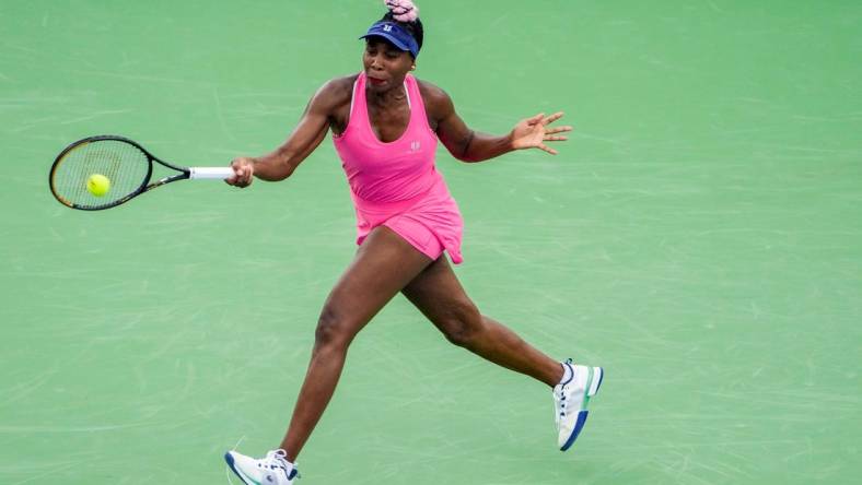 Aug 14, 2023; Mason, OH, USA; Venus Williams concentrates on her shot as she faces Veronika Kudermetova during round one of the Western & Southern Open at the Lindner Family Tennis Center in Mason Monday, August, 14, 2023. Mandatory Credit: Cara Owsley-USA TODAY Sports