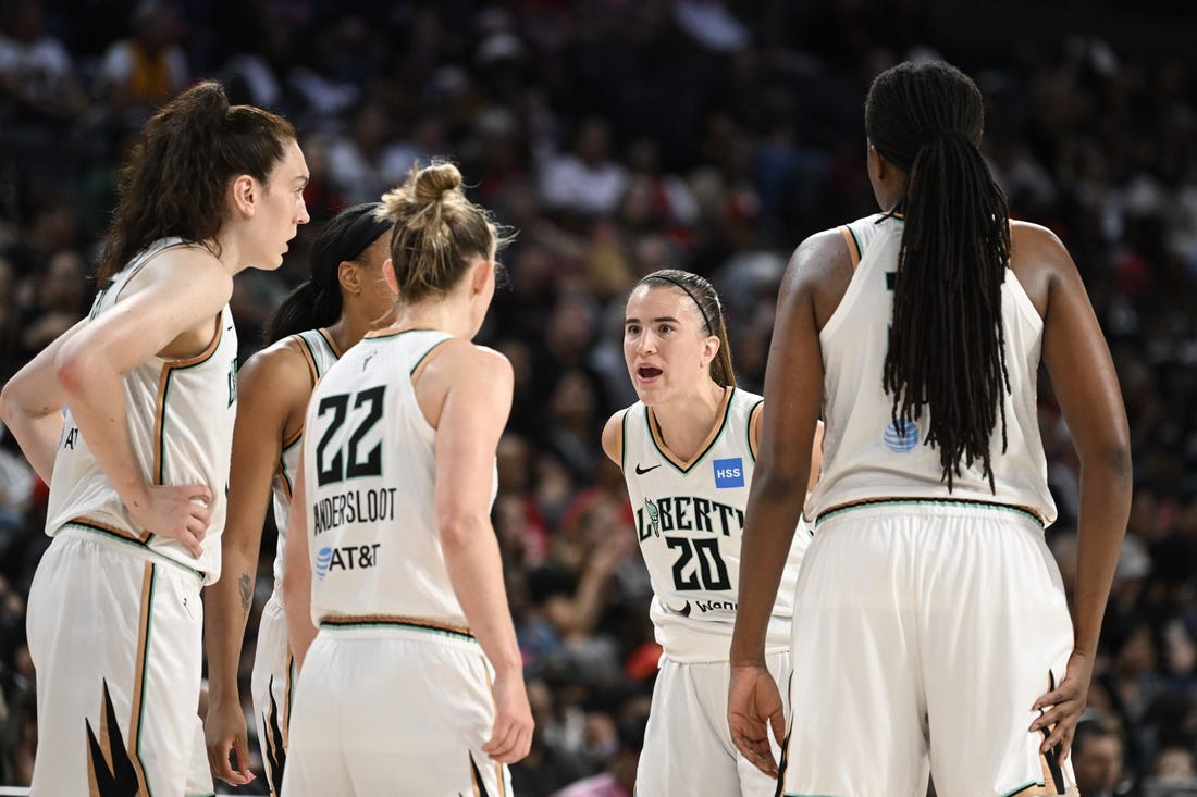 Aug 15, 2023; Las Vegas, Nevada, USA; New York Liberty guard Sabrina Ionescu (20) speaks to teammates during a timeout against the Las Vegas Aces during the fourth quarter at Michelob Ultra Arena. Mandatory Credit: Candice Ward-USA TODAY Sports