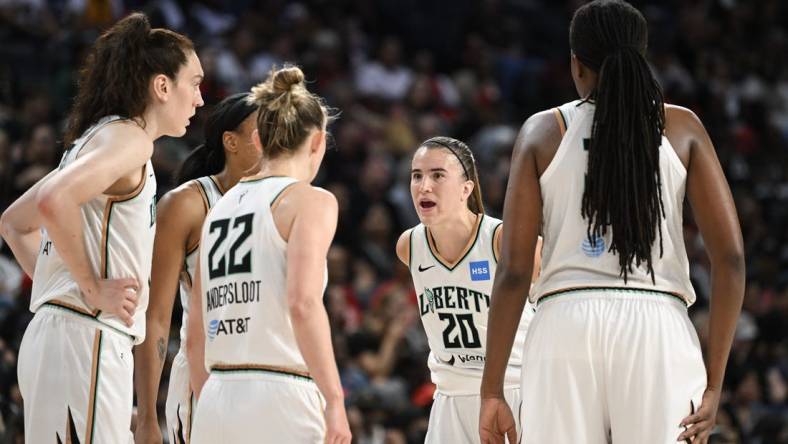 Aug 15, 2023; Las Vegas, Nevada, USA; New York Liberty guard Sabrina Ionescu (20) speaks to teammates during a timeout against the Las Vegas Aces during the fourth quarter at Michelob Ultra Arena. Mandatory Credit: Candice Ward-USA TODAY Sports