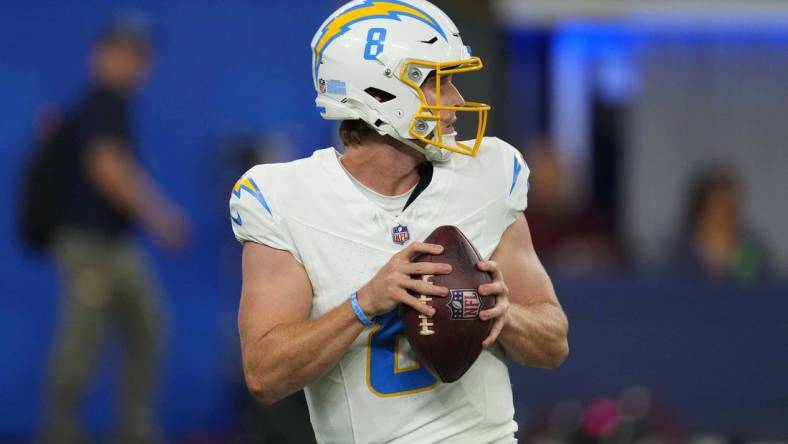 Aug 12, 2023; Inglewood, California, USA;Los Angeles Chargers quarterback Max Duggan (8) throws the ball aagainst the Los Angeles Rams in the second half at SoFi Stadium. Mandatory Credit: Kirby Lee-USA TODAY Sports