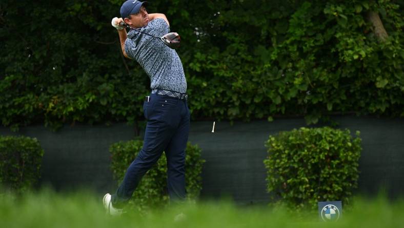 Aug 17, 2023; Olympia Fields, Illinois, USA; Rory McIlroy tees off from the second tee during the first round of the BMW Championship golf tournament. Mandatory Credit: Jamie Sabau-USA TODAY Sports