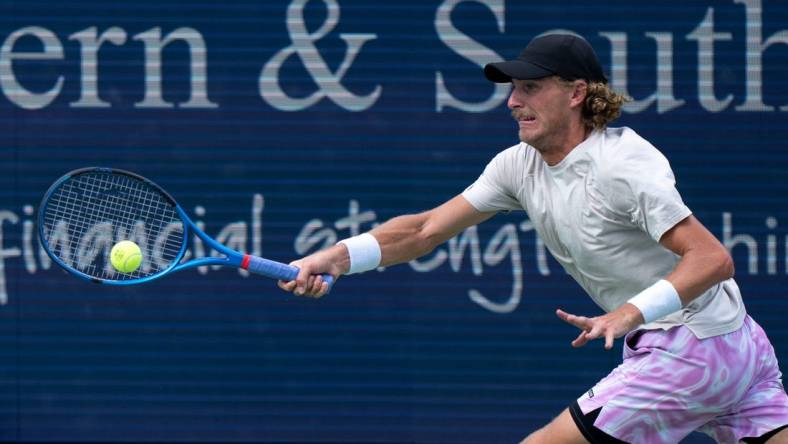 Max Purcell of Australia, hits a forehand to Carlos Alcaraz of Spain during the quarterfinals of the Western & Southern Open at the Lindner Family Tennis Center in Mason Friday, August, 18, 2023.