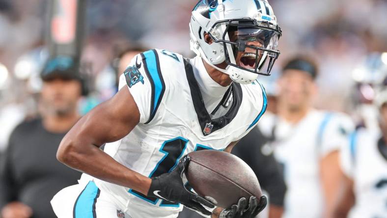 Aug 18, 2023; East Rutherford, New Jersey, USA; Carolina Panthers wide receiver DJ Chark Jr. (17) reacts after a catch during the first half against the New York Giants at MetLife Stadium. Mandatory Credit: Vincent Carchietta-USA TODAY Sports