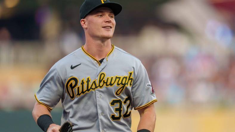 Aug 18, 2023; Minneapolis, Minnesota, USA; Pittsburgh Pirates right fielder Henry Davis (32) walks off the field after the first inning at Target Field. Mandatory Credit: Matt Blewett-USA TODAY Sports