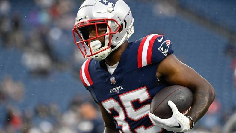 Aug 10, 2023; Foxborough, Massachusetts, USA; New England Patriots running back Pierre Strong Jr. (35) warms up before a game against the Houston Texans at Gillette Stadium. Mandatory Credit: Eric Canha-USA TODAY Sports