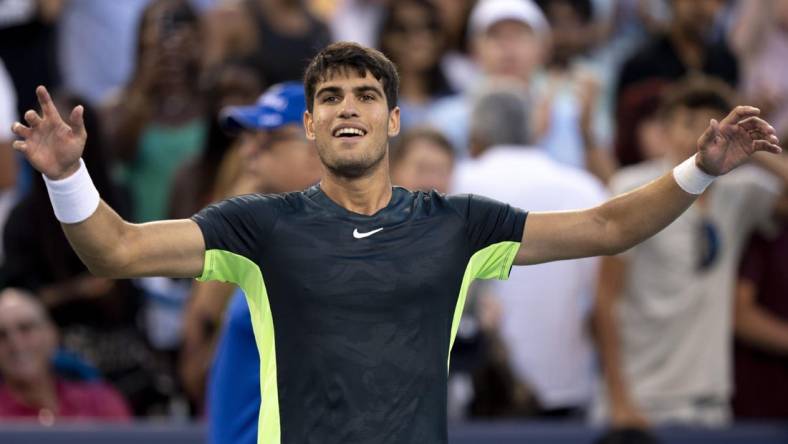 Aug 19, 2023; Mason, OH, USA;  Carlos Alcaraz, of Spain, greets the crowd after defeating Hubert Hurkacz, of Poland, during the semifinal of the Western & Southern Open at the Lindner Family Tennis Center. Mandatory Credit: Albert Cesare-USA TODAY Sports