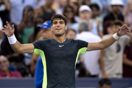 Aug 19, 2023; Mason, OH, USA;  Carlos Alcaraz, of Spain, greets the crowd after defeating Hubert Hurkacz, of Poland, during the semifinal of the Western & Southern Open at the Lindner Family Tennis Center. Mandatory Credit: Albert Cesare-USA TODAY Sports
