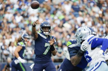 Aug 19, 2023; Seattle, Washington, USA; Seattle Seahawks quarterback Geno Smith (7) passes against the Dallas Cowboys during the first quarter at Lumen Field. Mandatory Credit: Joe Nicholson-USA TODAY Sports