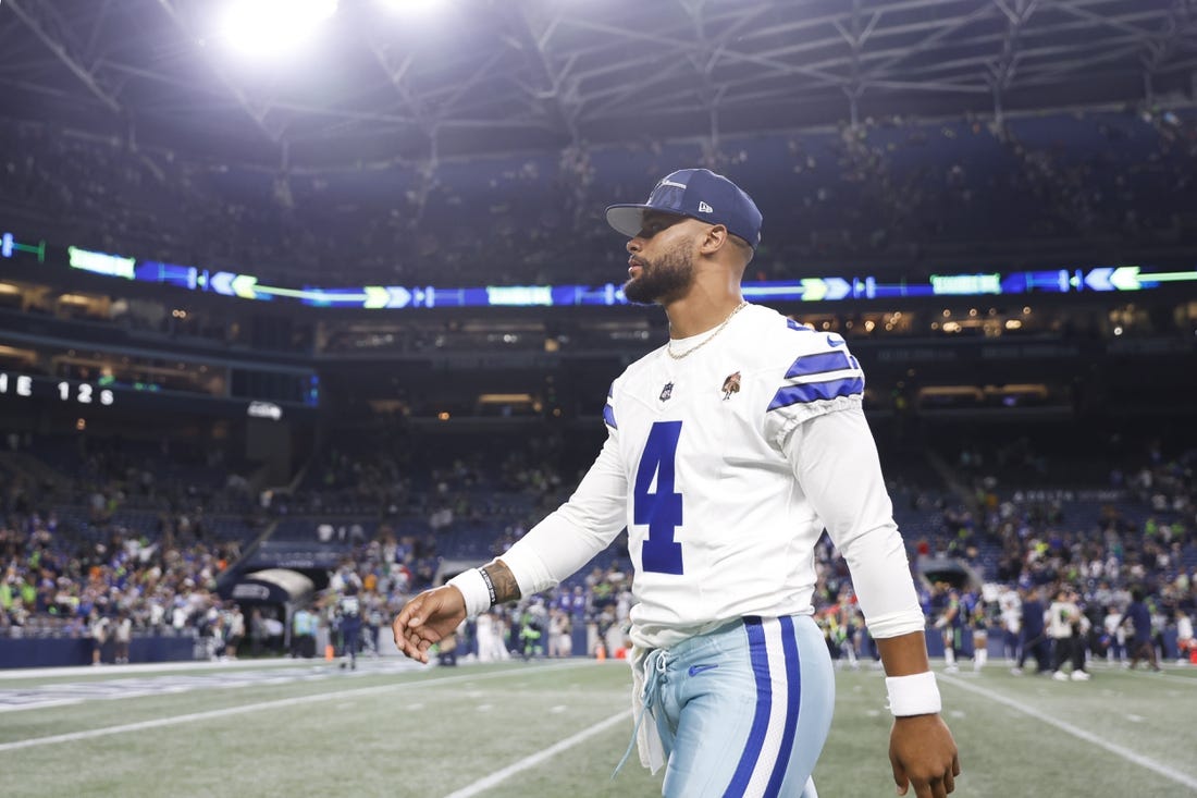 Aug 19, 2023; Seattle, Washington, USA; Dallas Cowboys quarterback Dak Prescott (4) walks to the locker room following a 22-14 Seattle victory at Lumen Field. Mandatory Credit: Joe Nicholson-USA TODAY Sports