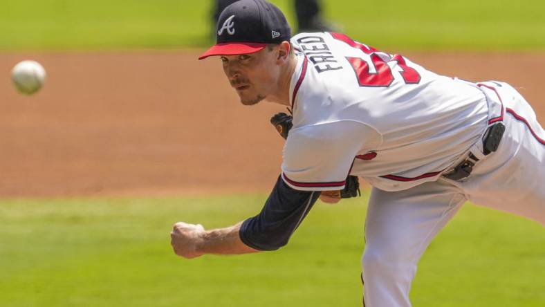 Aug 20, 2023; Cumberland, Georgia, USA; Atlanta Braves starting pitcher Max Fried (54) pitches against the San Francisco Giants during the first inning at Truist Park. Mandatory Credit: Dale Zanine-USA TODAY Sports