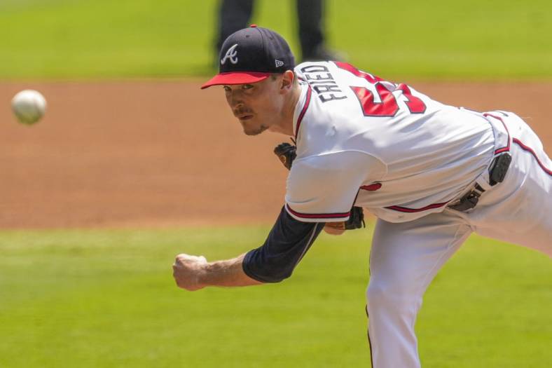 Aug 20, 2023; Cumberland, Georgia, USA; Atlanta Braves starting pitcher Max Fried (54) pitches against the San Francisco Giants during the first inning at Truist Park. Mandatory Credit: Dale Zanine-USA TODAY Sports