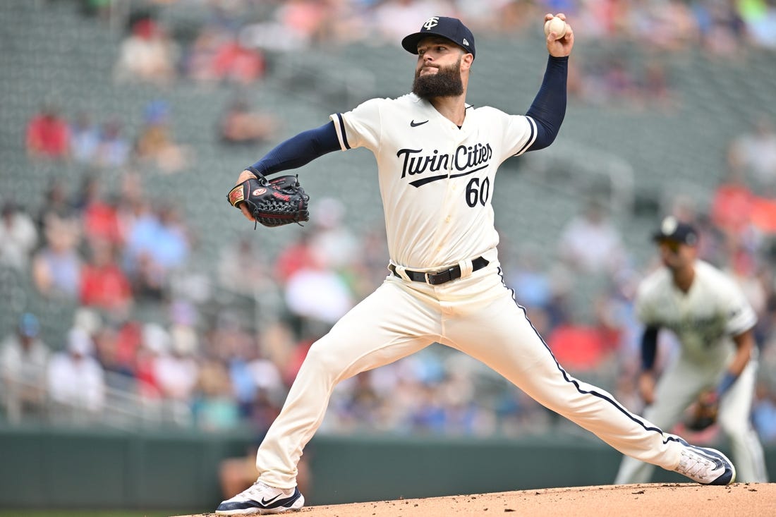 Aug 20, 2023; Minneapolis, Minnesota, USA; Minnesota Twins starting pitcher Dallas Keuchel (60) throws a pitch against the Pittsburgh Pirates during the first inning at Target Field. Mandatory Credit: Jeffrey Becker-USA TODAY Sports