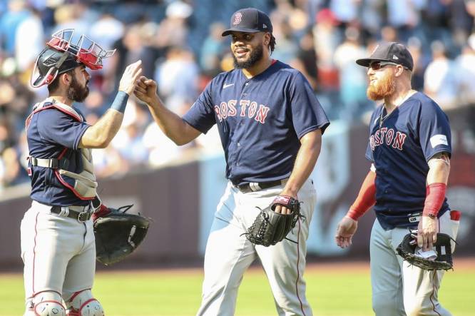 Justin Turner of the Boston Red Sox celebrates his two-run double