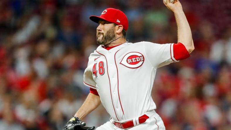 Aug 15, 2023; Cincinnati, Ohio, USA; Cincinnati Reds relief pitcher Alex Young (48) pitches against the Cleveland Guardians in the eighth inning at Great American Ball Park. Mandatory Credit: Katie Stratman-USA TODAY Sports