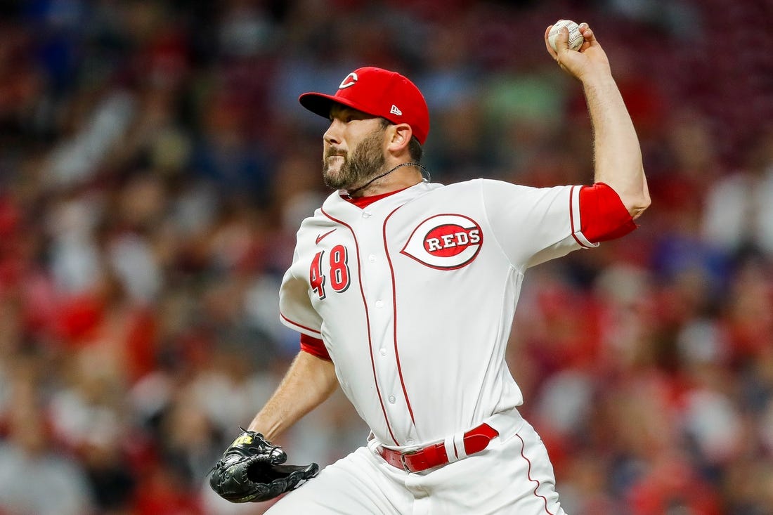Aug 15, 2023; Cincinnati, Ohio, USA; Cincinnati Reds relief pitcher Alex Young (48) pitches against the Cleveland Guardians in the eighth inning at Great American Ball Park. Mandatory Credit: Katie Stratman-USA TODAY Sports