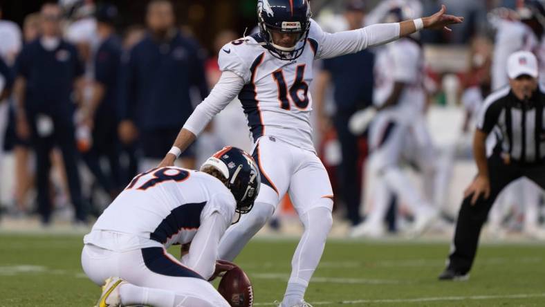 Aug 19, 2023; Santa Clara, California, USA;  Denver Broncos punter Riley Dixon (19) holds the ball for place kicker Brett Maher (16) during the third quarter against the San Francisco 49ers at Levi's Stadium. Mandatory Credit: Stan Szeto-USA TODAY Sports